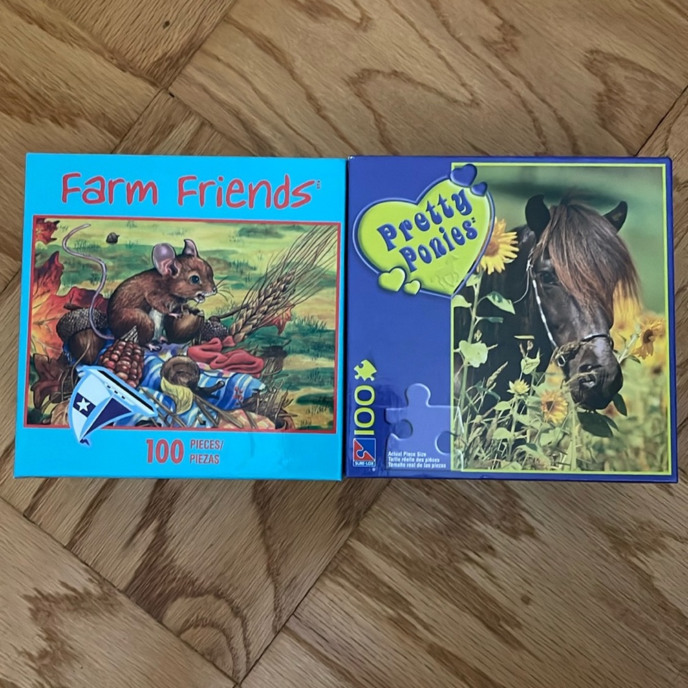 2 Boxes of 100pc. Puzzles